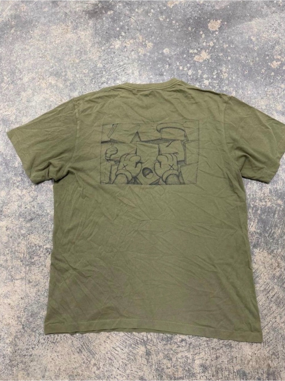 KAWS olive green tee with a chest pocket